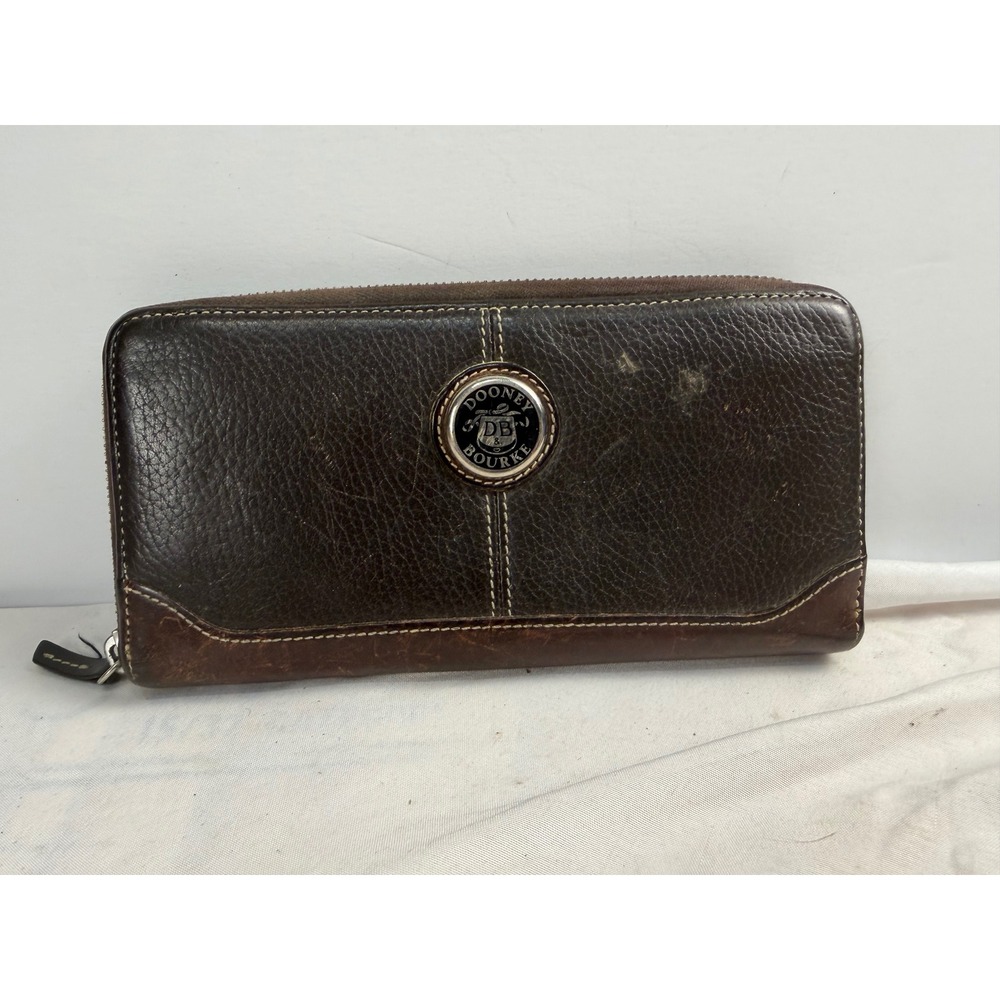 Dooney & Bourke Dark Brown Pebbled Leather Zip Around Continental Wallet Logo
